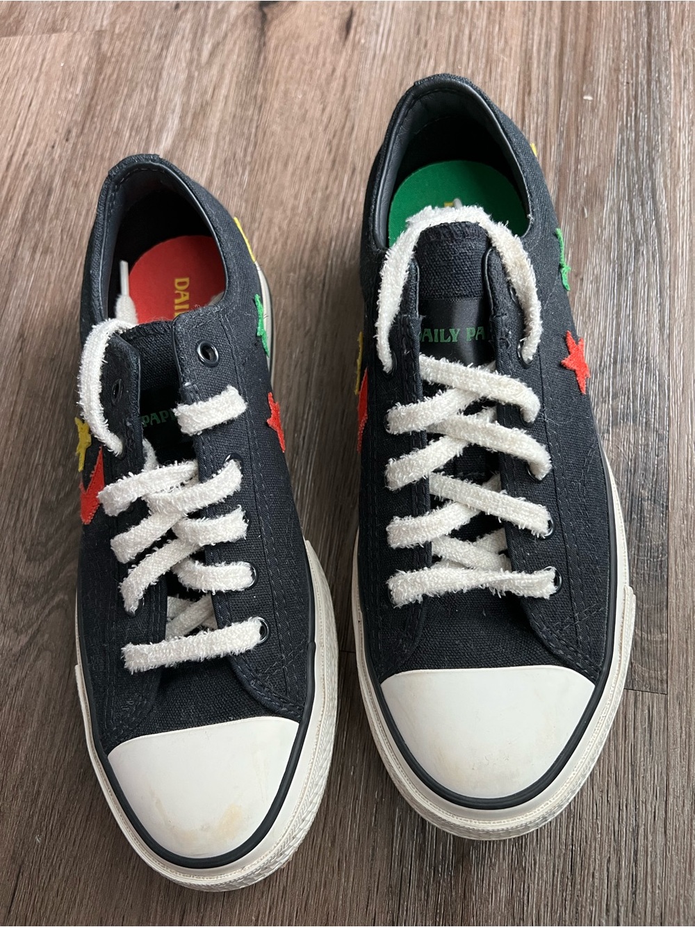 Converse Black Canvas Sneakers with Multicolor Star Patches and Cream Laces